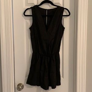 Black Vessos romper. With tags